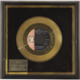 Larry's gold record for "Aquarius" by The 5th Dimension